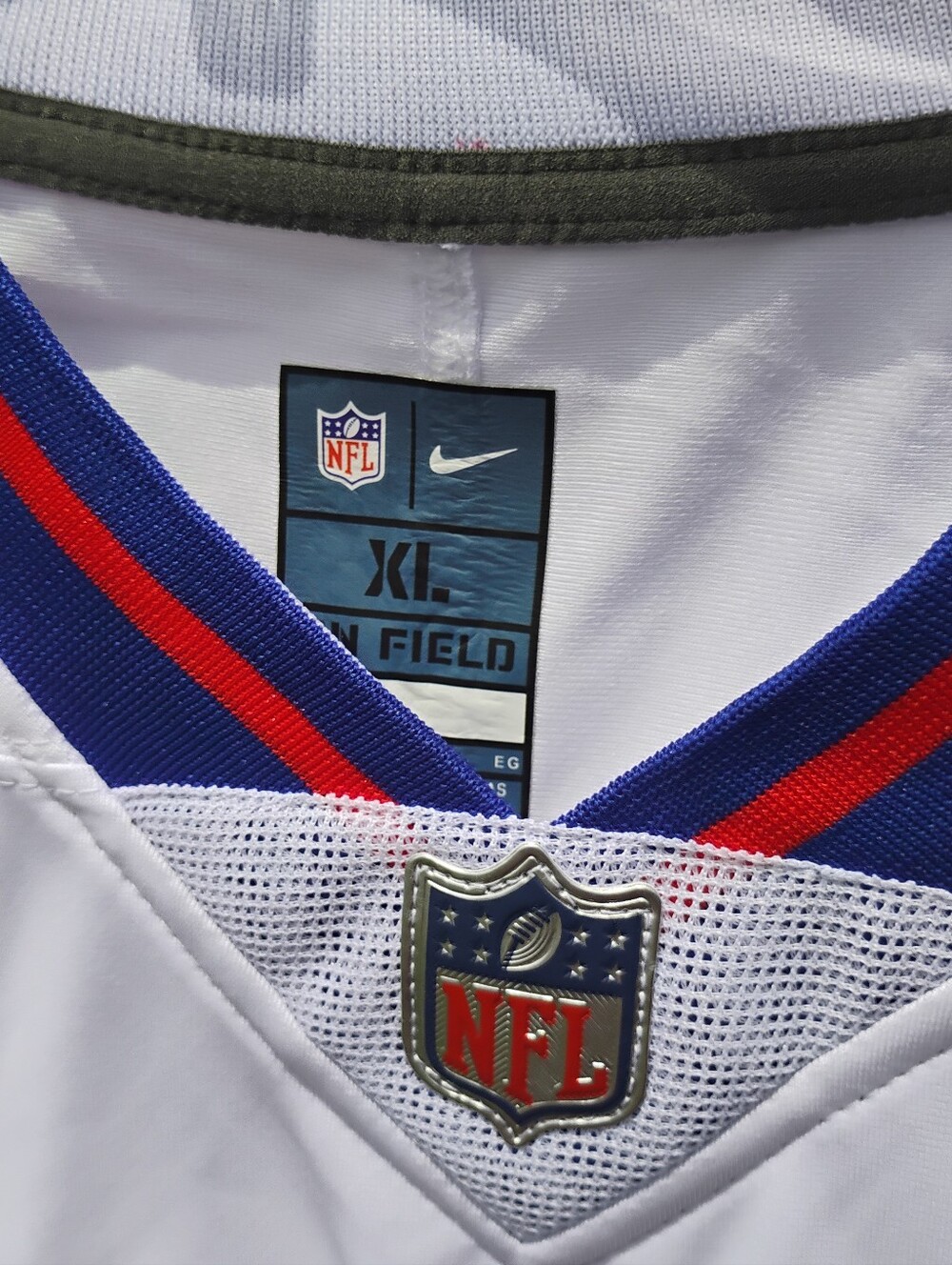 Nike White Jersey with Blue and Red V-Neck Trim